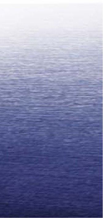a blurry photo of a blue ocean